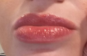 Honest Beauty Lip Gloss in Inspired Kiss - swatch