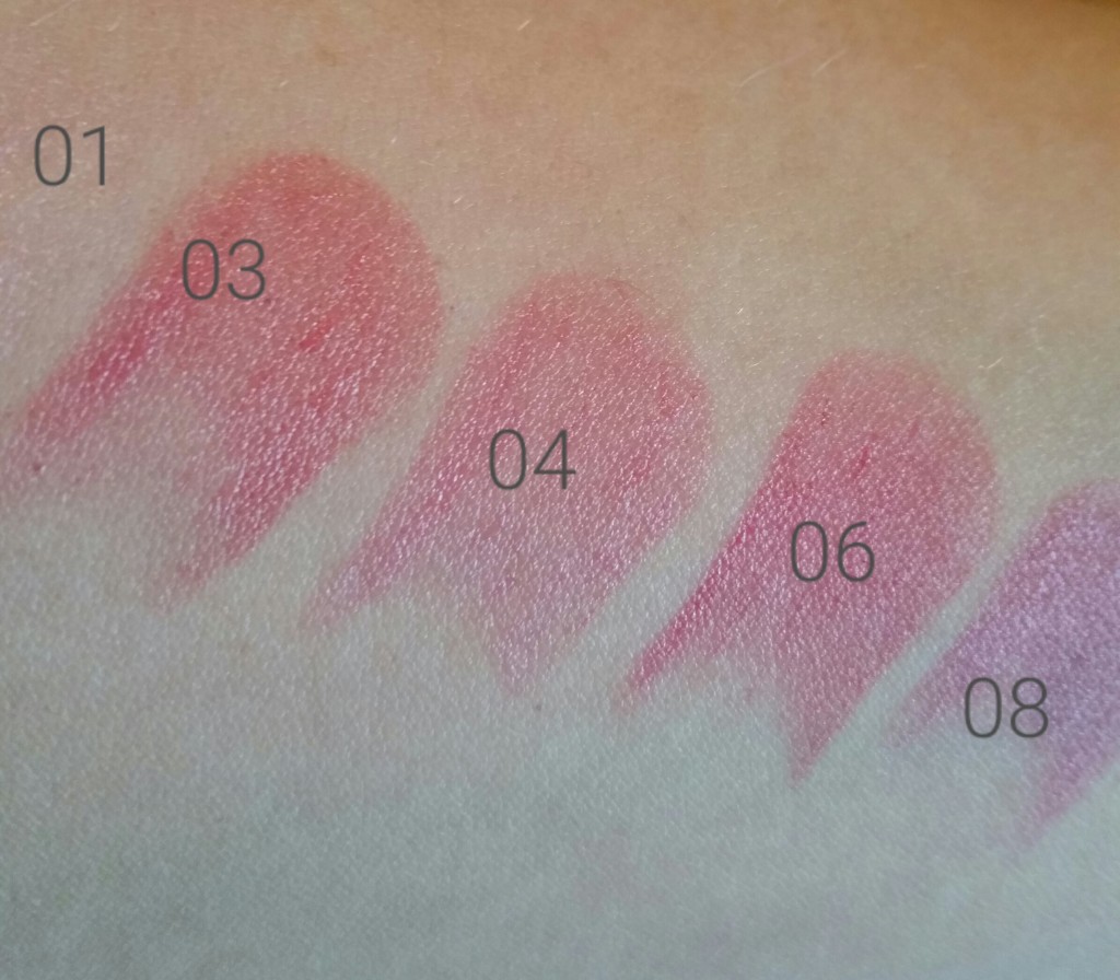 Left to right: Sephora Collection Rouge Balm SPF 20 in Delicate Pink 01, Enchanting Blush 03, Sweet Fushcia 04, Soft Rose 06 (says Soft Red on the site), Subtle Peony 08, swatched on arm - natural light