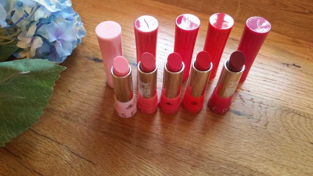 Left to right: Sephora Collection Rouge Balm SPF 20 in Delicate Pink 01, Enchanting Blush 03, Sweet Fushcia 04, Soft Rose 06 (says Soft Red on the site), Subtle Peony 08. 