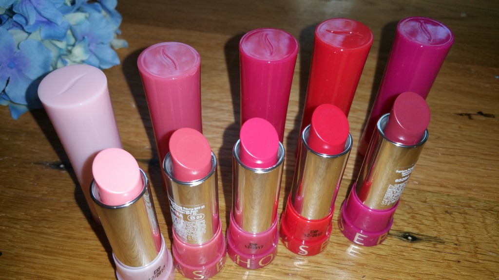 Left to right: Sephora Collection Rouge Balm SPF 20 in Delicate Pink 01, Enchanting Blush 03, Sweet Fushcia 04, Soft Rose 06 (says Soft Red on the site), Subtle Peony 08. 