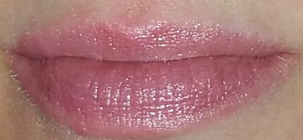 Coola Mineral Liplux SPF 30 in Summer Crush swatched on lips with flash