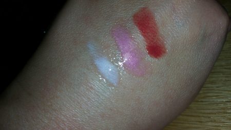 Colorescience Sunforgettable Lip Shine SPF 35 - Clear, Pink, and Siren (left to right) - swatched on hand - flash